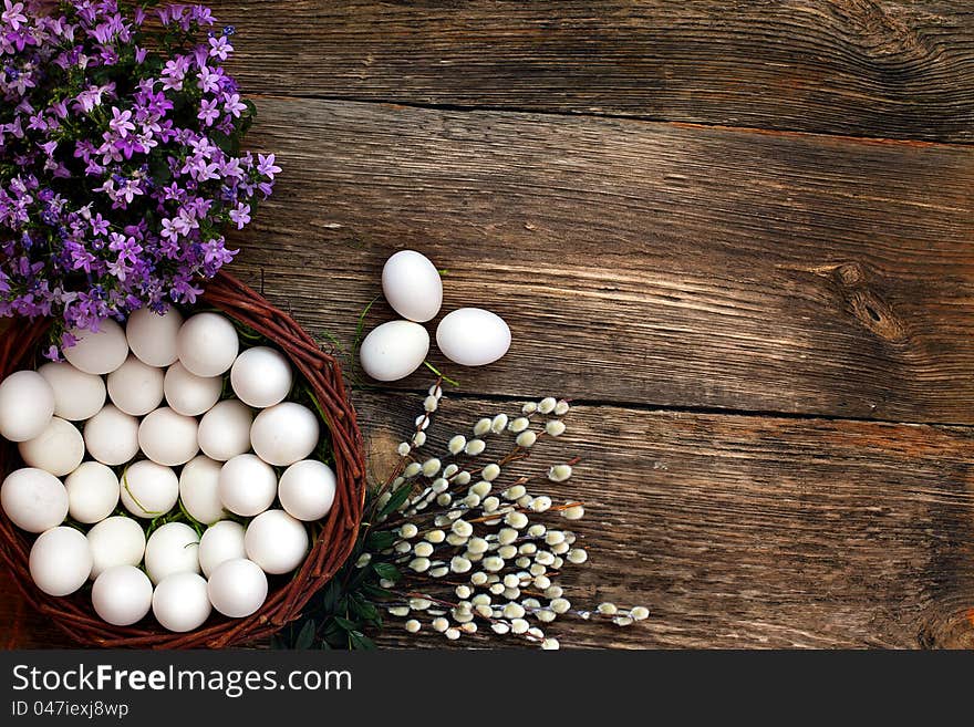 Easter eggs and  natural wooden country table, background and texture