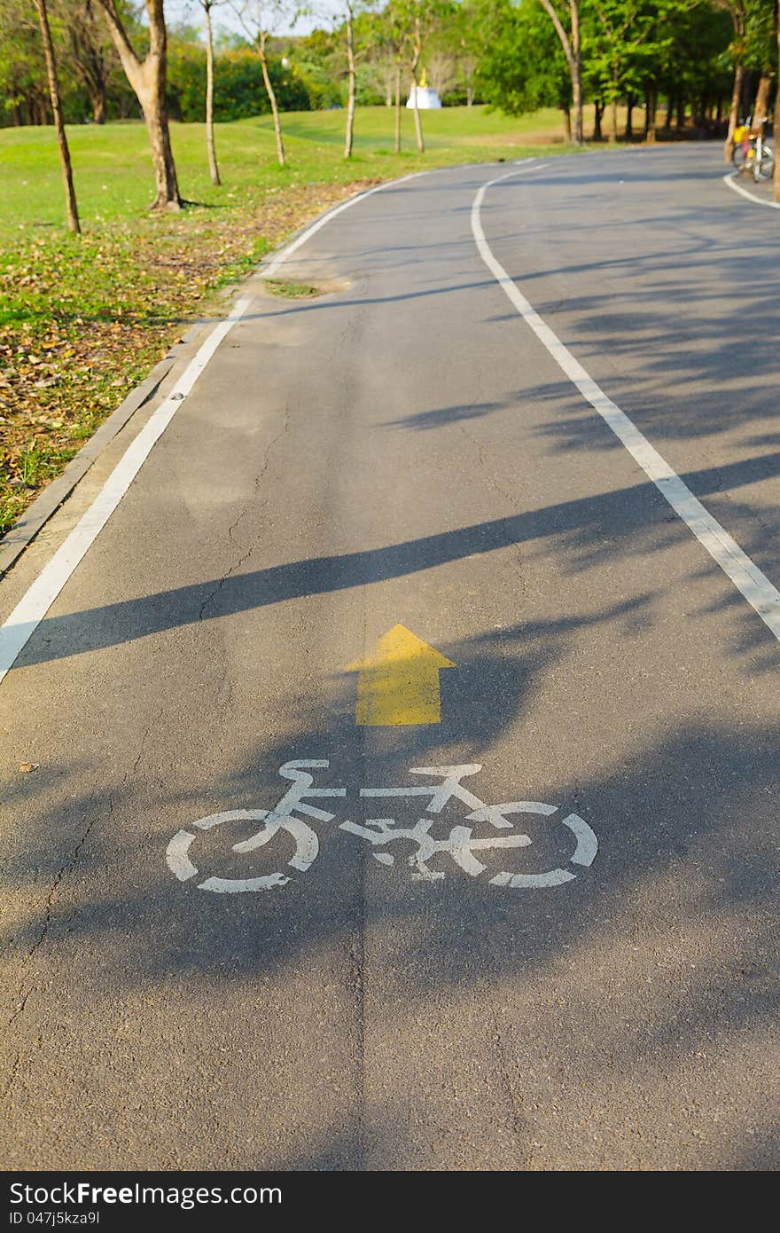 Bicycle sign with bicycle path in park