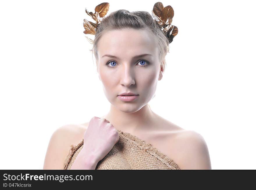 Portrait of a beautiful woman with a laurel wreath