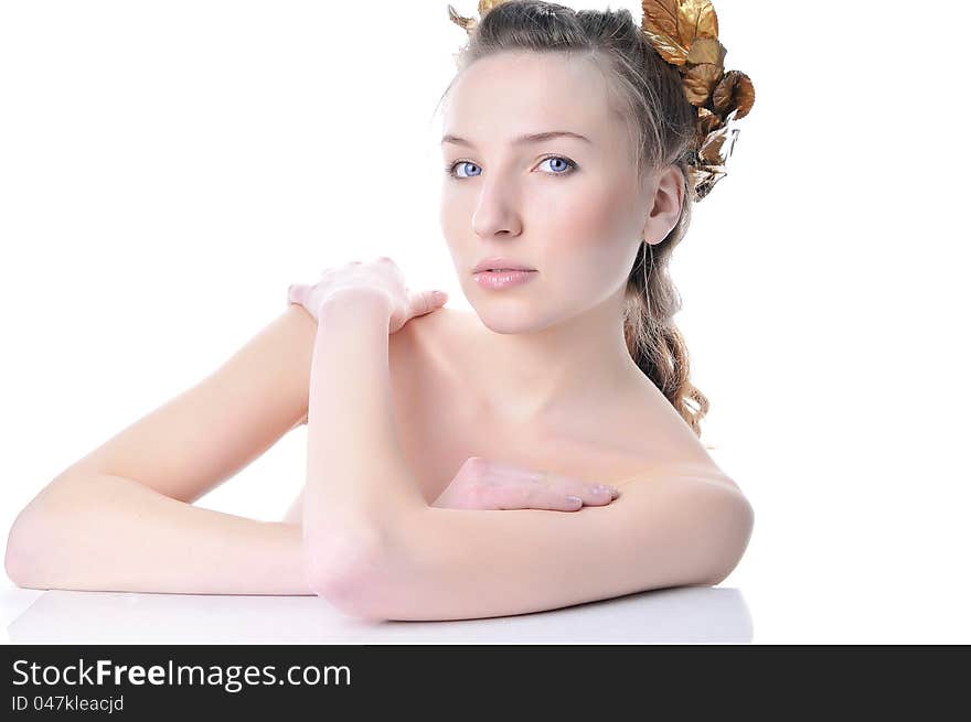 Portrait of a beautiful woman with a laurel wreath