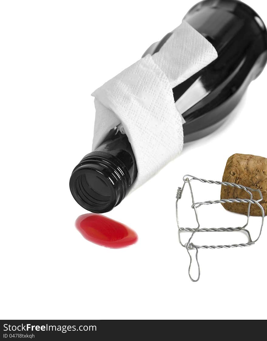 Poured out wine, empty bottle and cork