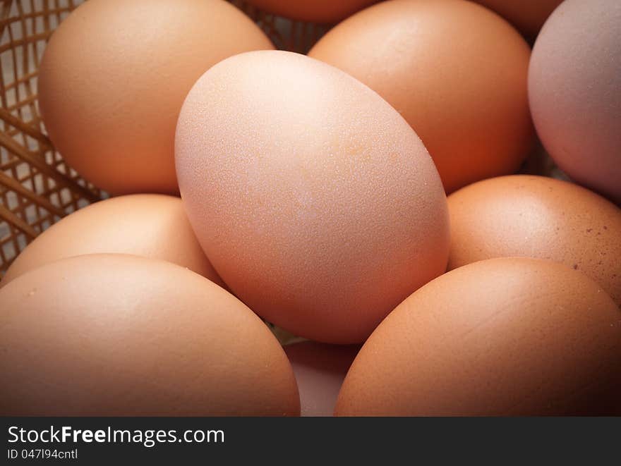 Composition of chicken eggs and wicker baskets