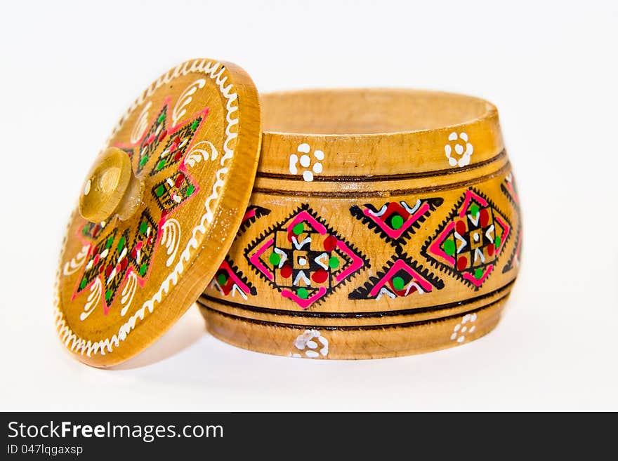 Wooden box painted with traditional ornaments on white background. Wooden box painted with traditional ornaments on white background