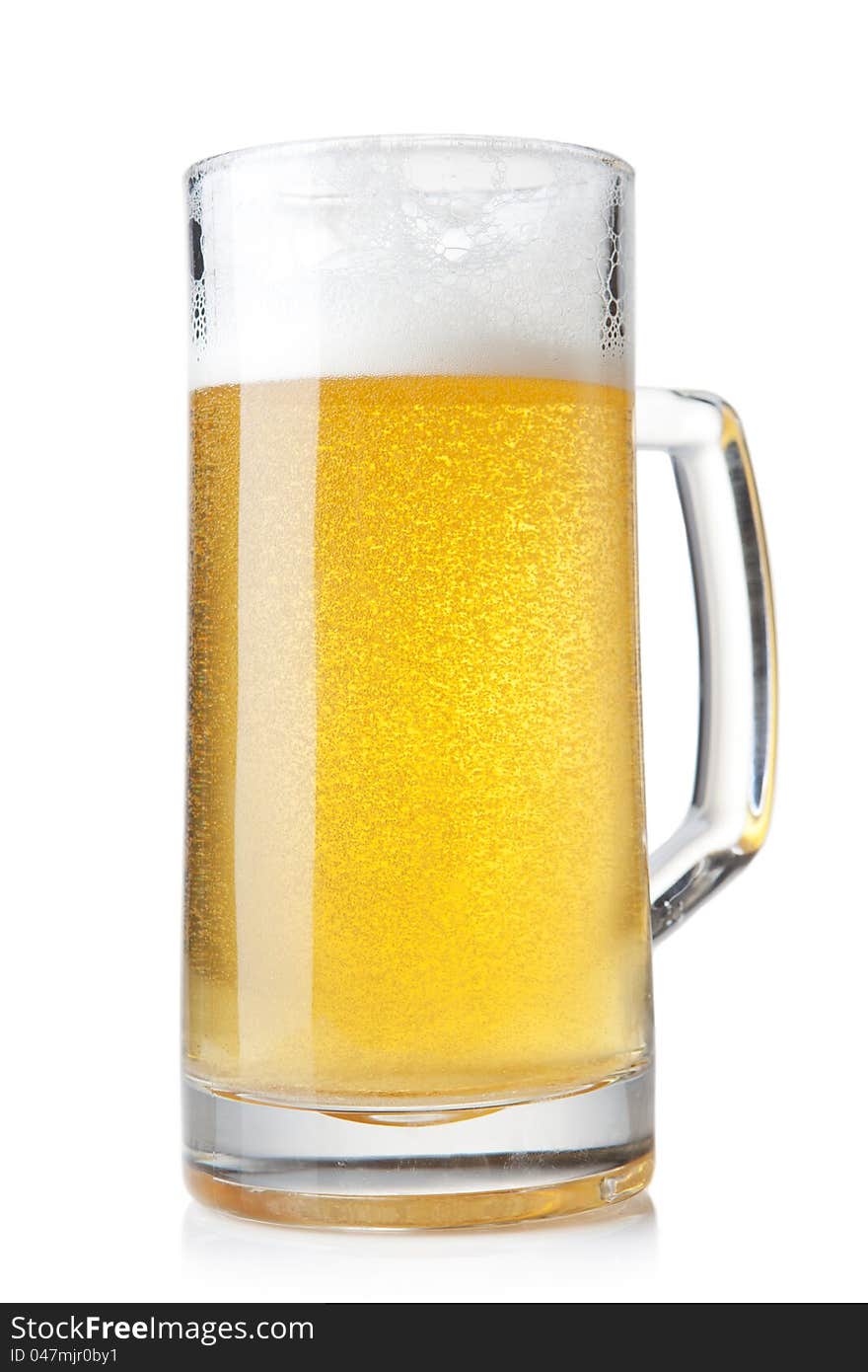 Beer into glass on a white background