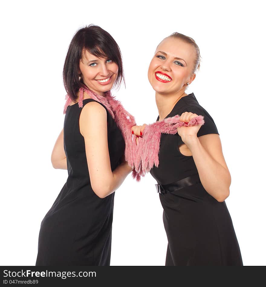 Two pretty women smiling standing scarf black dress