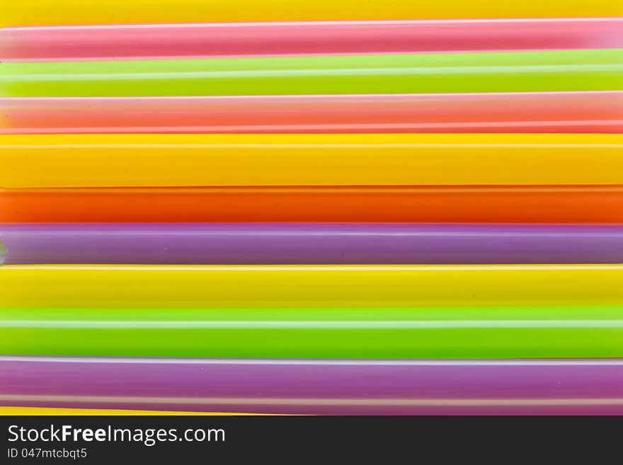 Abstract background from many multi-color of straw