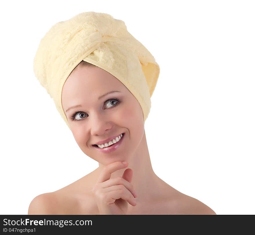 Portrait of a beautiful healthy girl in a clean towel isolated on white background