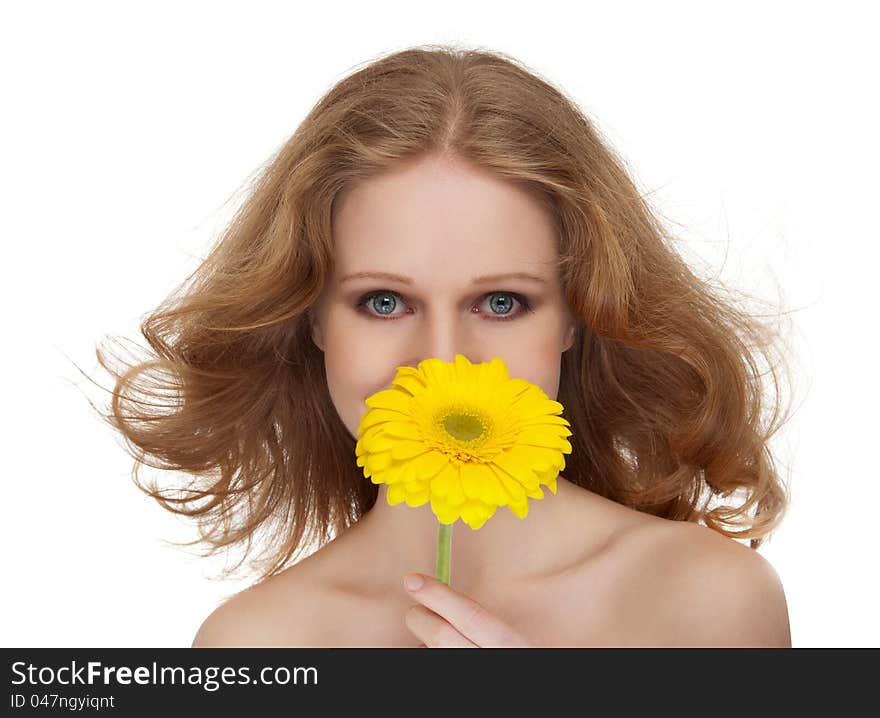 Beautiful girl with flowing hair, yellow gerbera