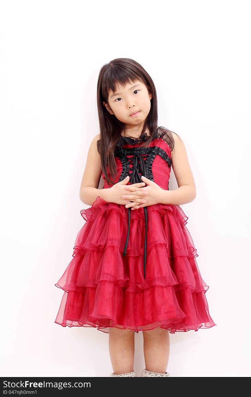 Fashionable little asian girl wearing dress. Fashionable little asian girl wearing dress