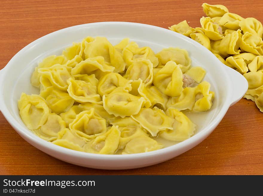 Tortellini with ham broth