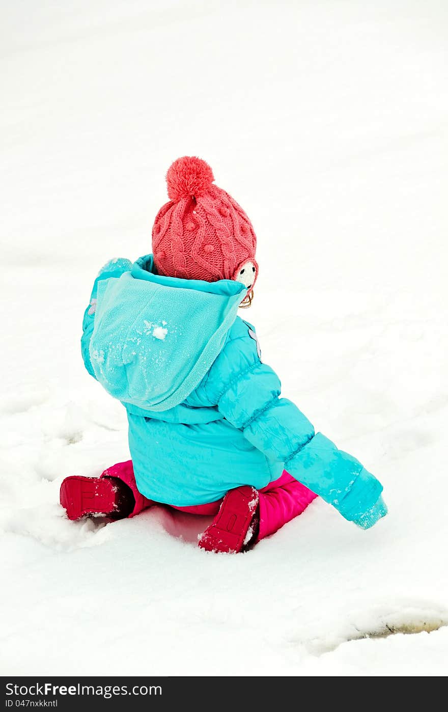 Kid Playing In The Snow