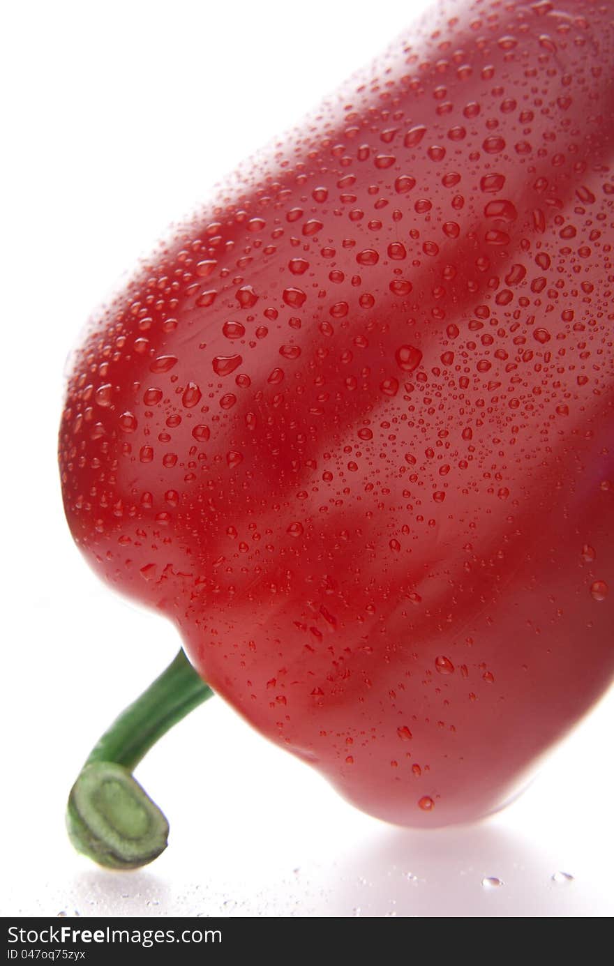 Close up of fresh red pepper isolated on white