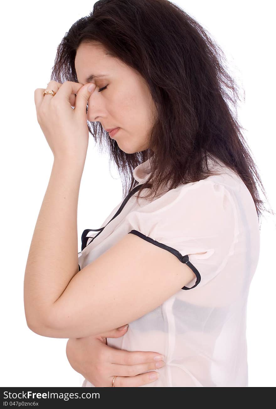 A woman having a headache, closeup isolated