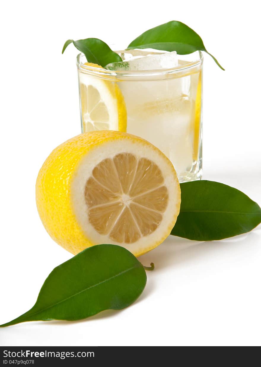 Lemon drink with ice on a white background