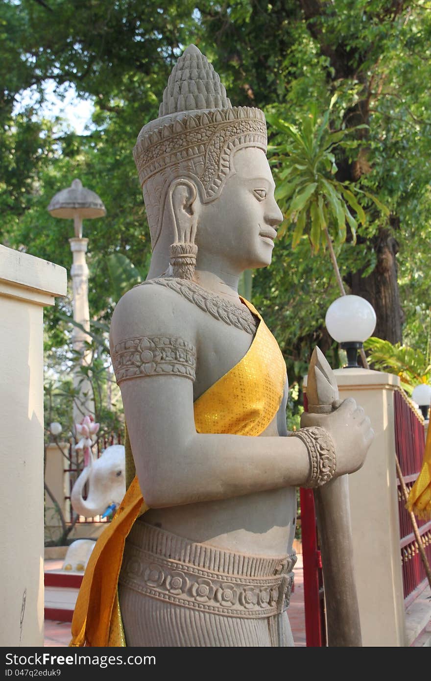 Religious statue in buddhist city pillar, Siemreap, Khmer Republic