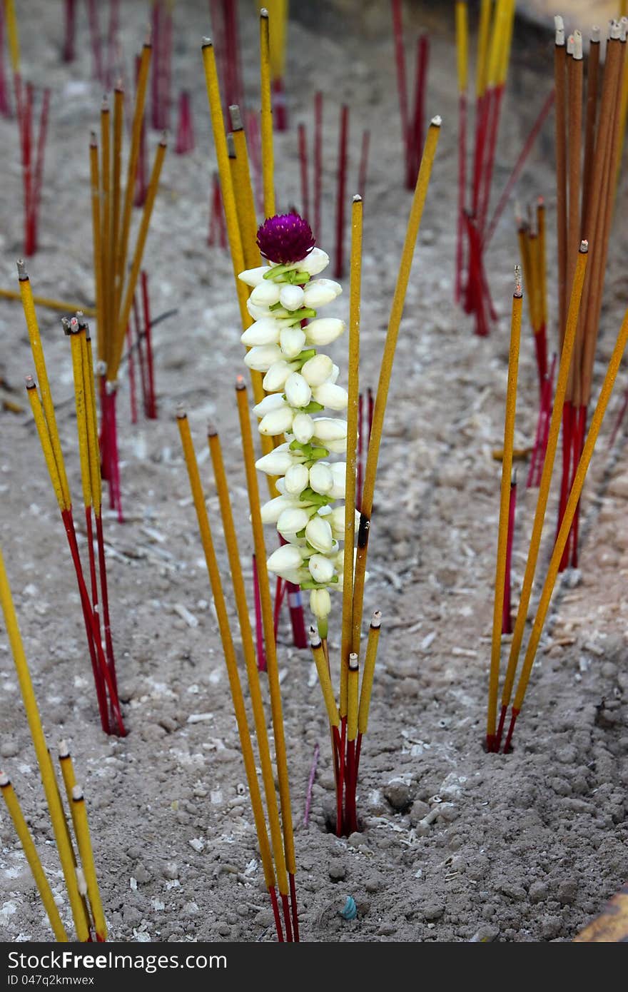 Joss Sticks And Jasmine Flower In Pot