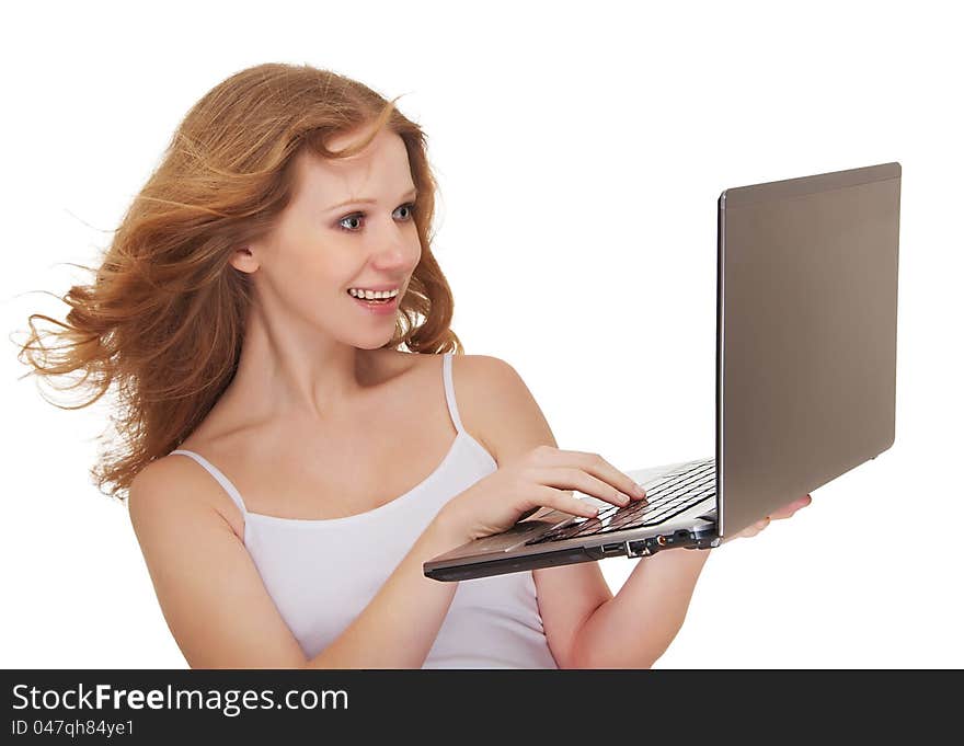 Beautiful happy girl hair holding laptop