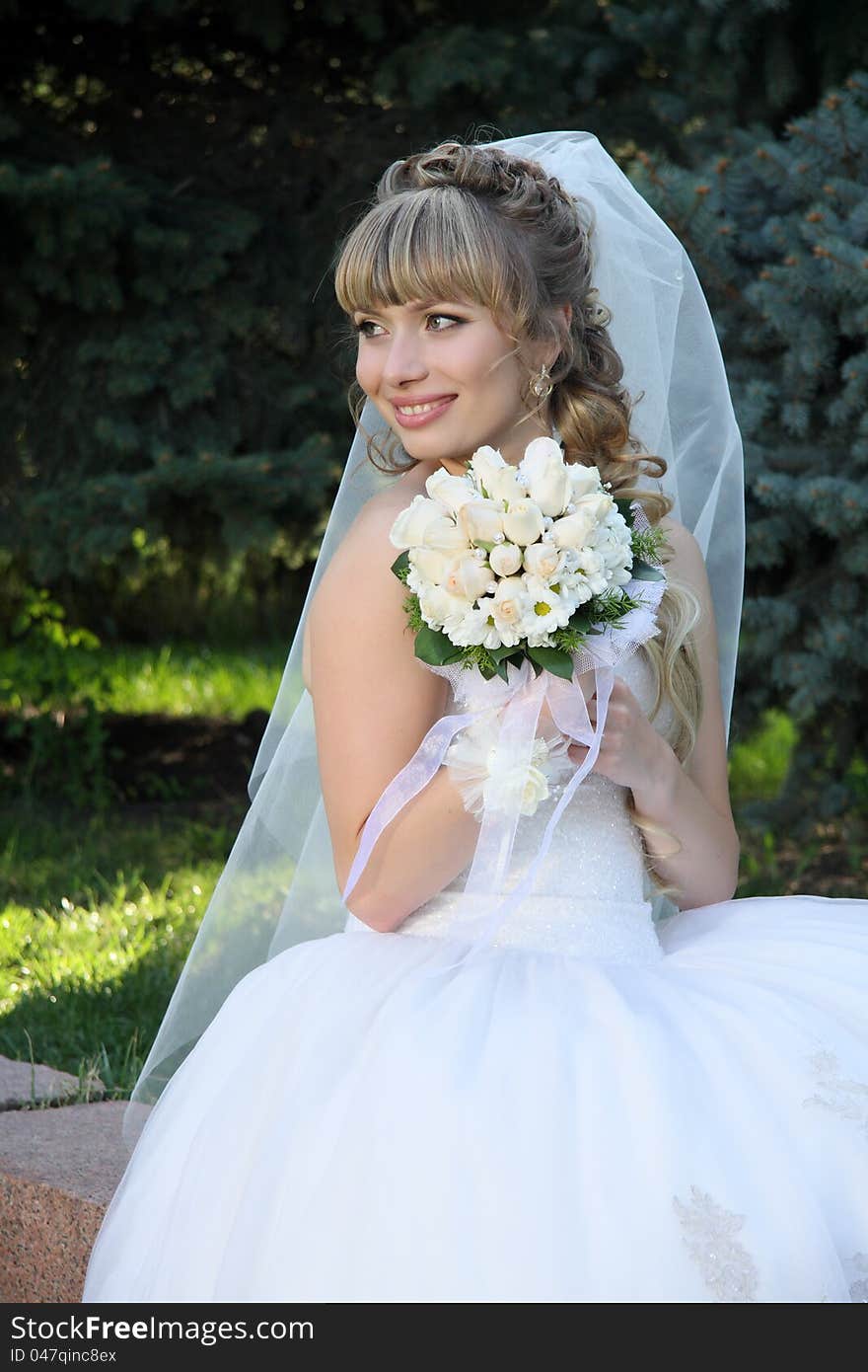 Bride with  wedding bouquet.