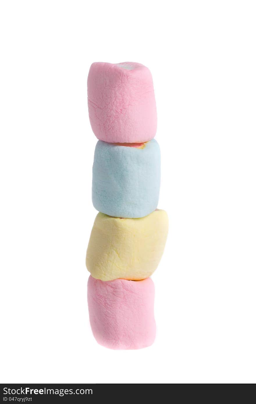 Stack colorful marshmallows on a white background