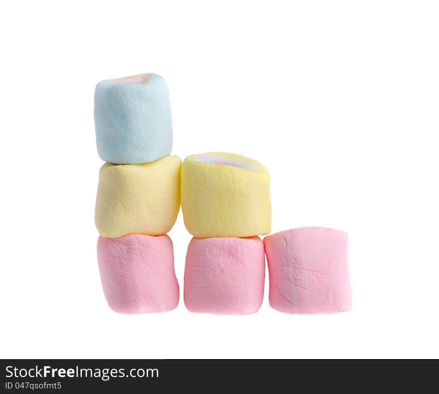 Stack colorful marshmallows on a white background