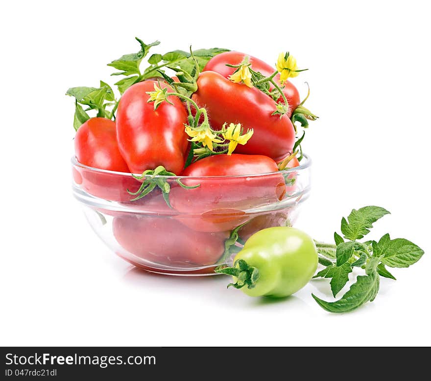 Close-up of a variety ripened red tomatoes in a bowl