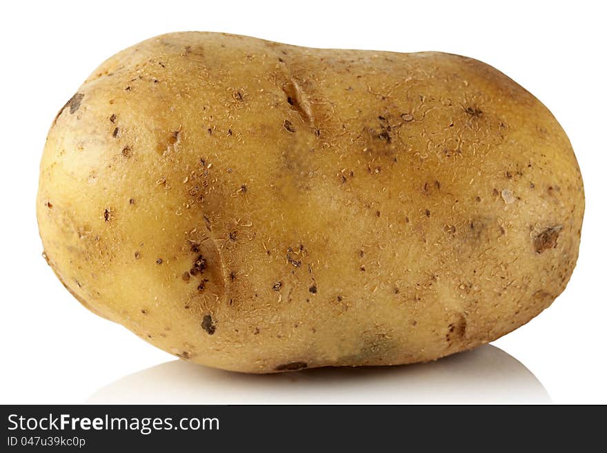 Potatoes on a white background with reflection. Potatoes on a white background with reflection.