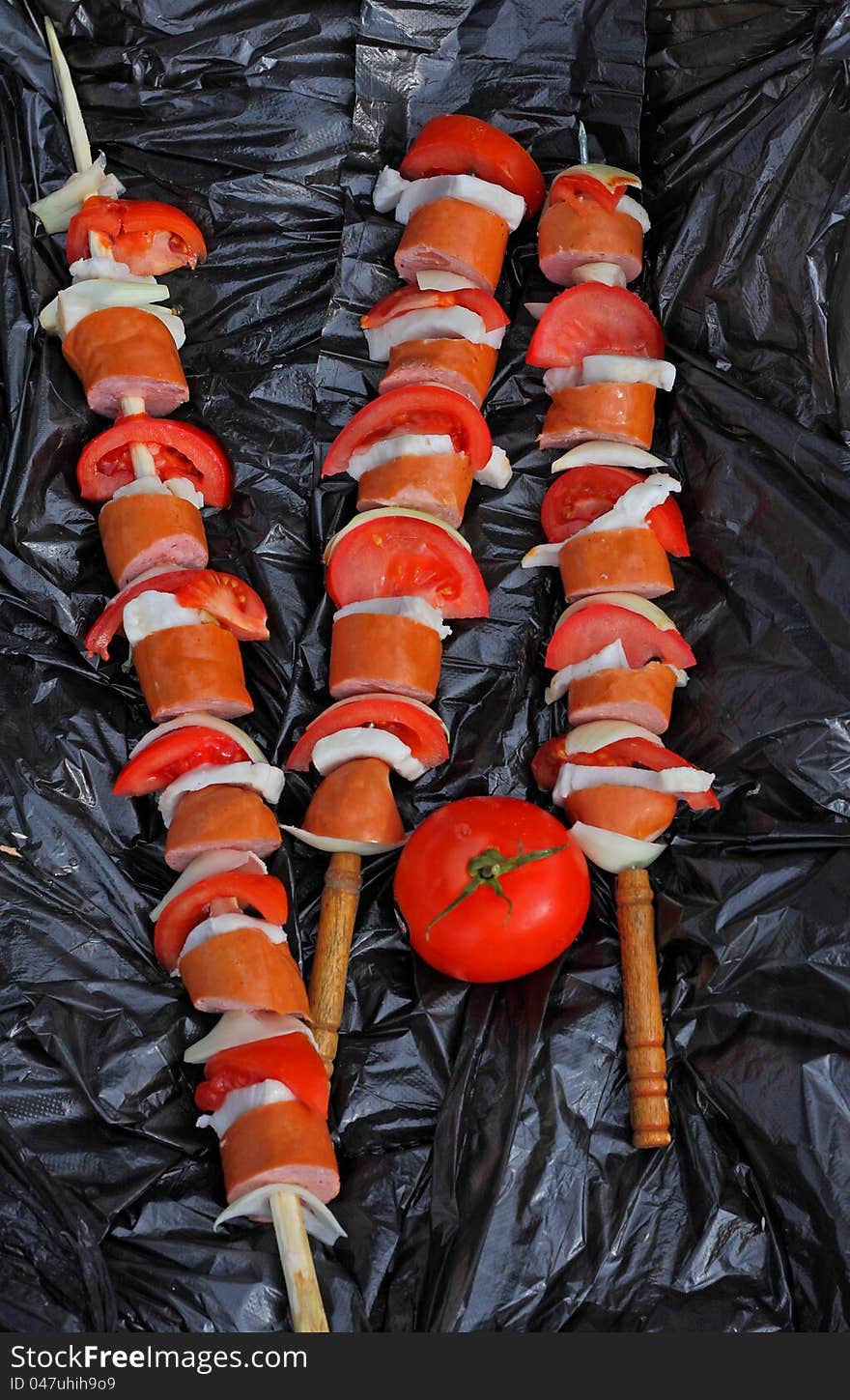 Three Sausage on a skewer