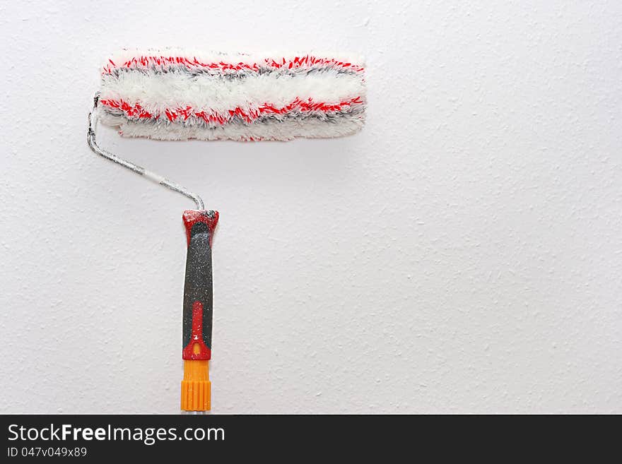 Paint Roller On The Wall