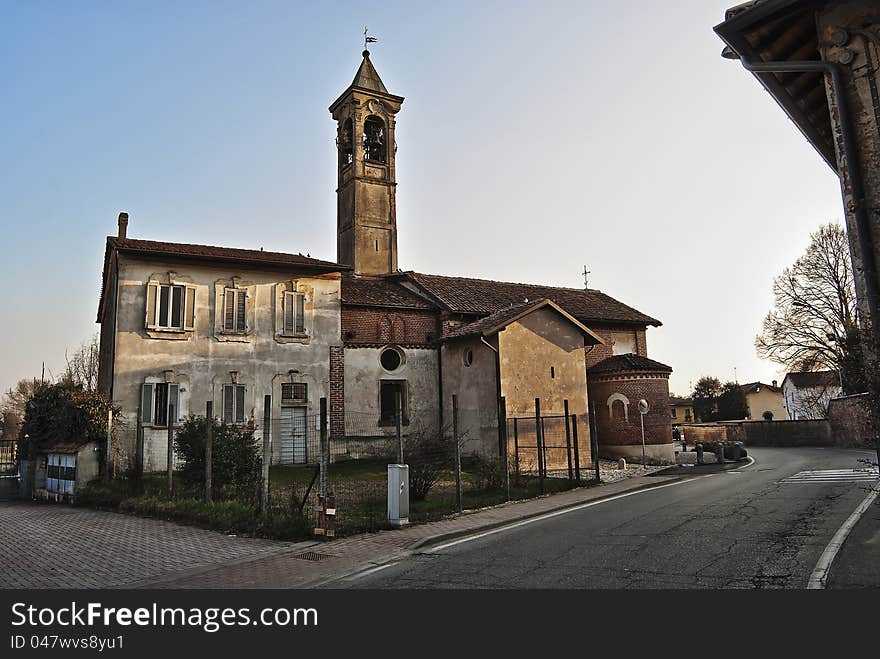 Italian country little church during the sunset