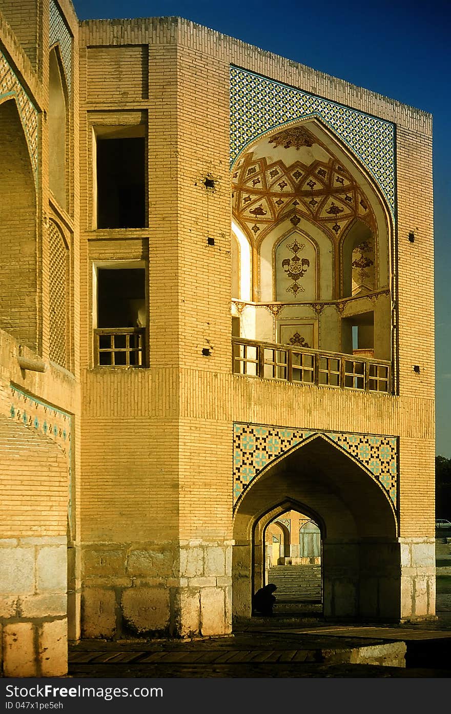 Lonely man sitting under a bridge pillar in Esfahan, Iran. Lonely man sitting under a bridge pillar in Esfahan, Iran.