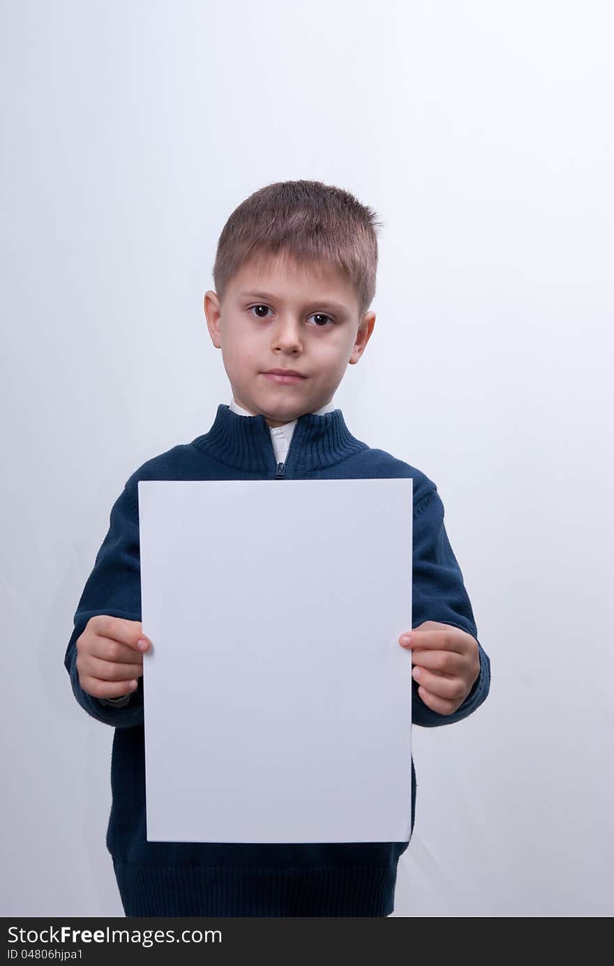 Child With The White Sheet Of Paper