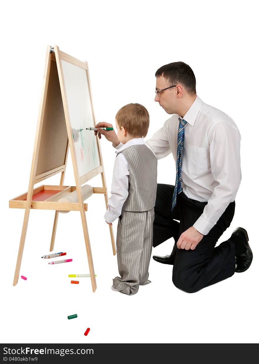 Businessman teaches his son to paint on an easel, isolate on white