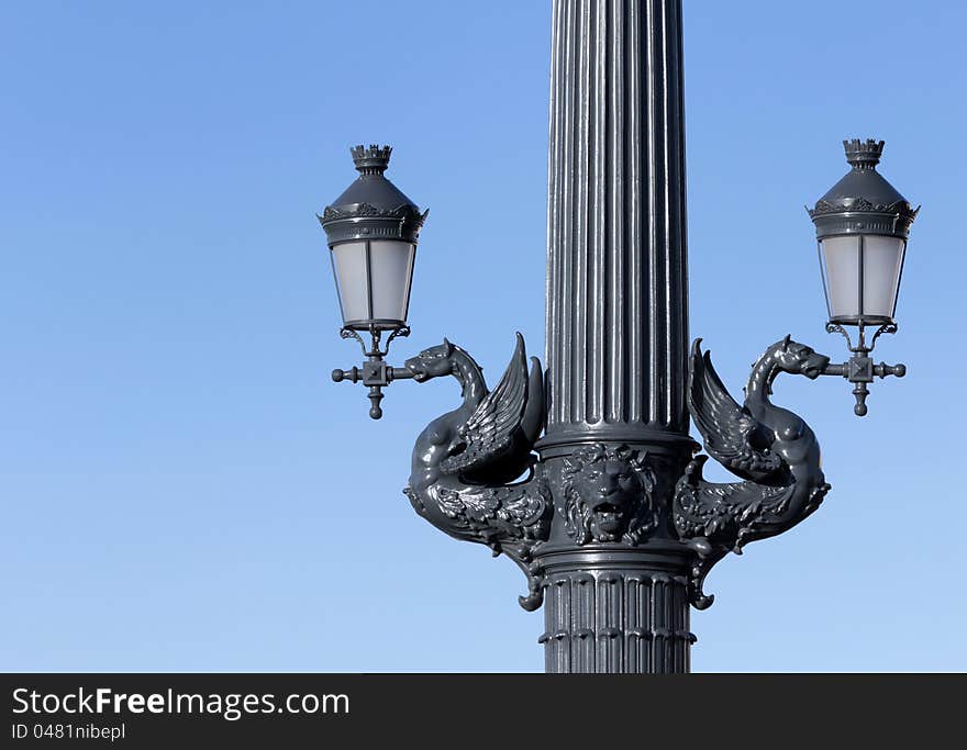 Double ornate street lamps.