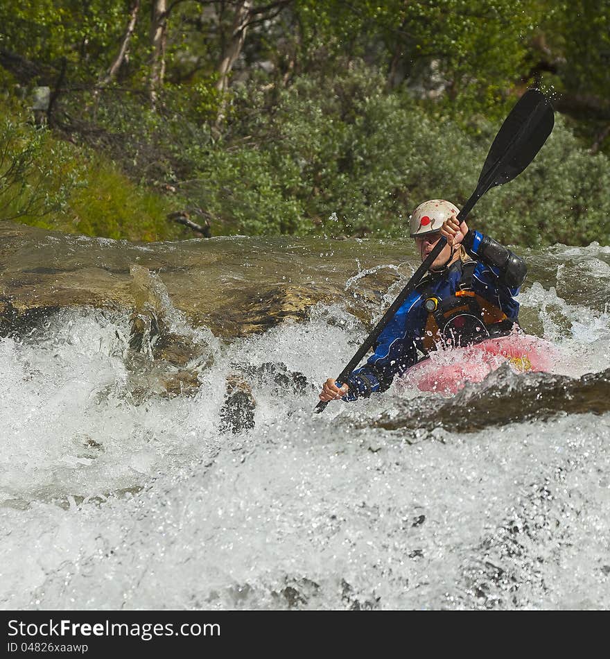 Kayaker In The Waterfall