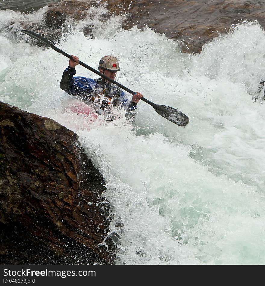 Kayaker In The Waterfall