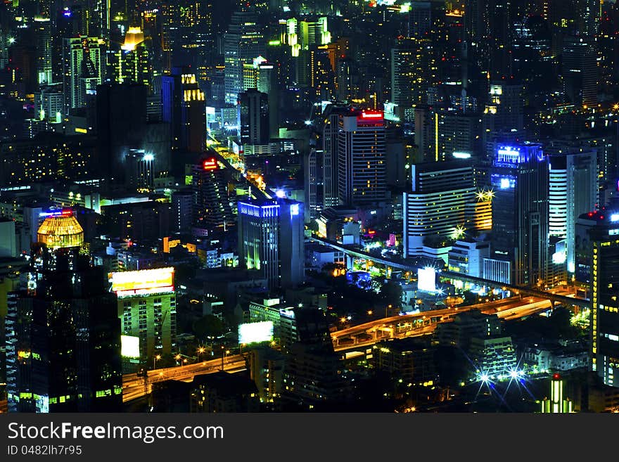 View over the city of bangkok at nighttime with skyscrapers