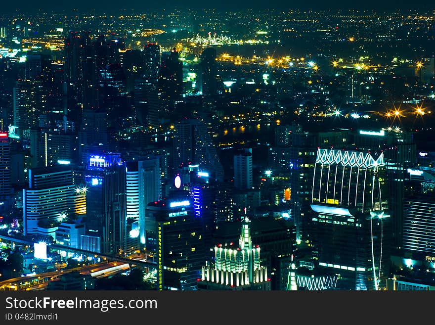 View over the city of bangkok at nighttime with skyscrapers