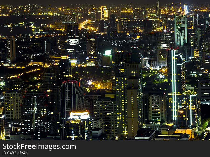 View over the city of bangkok at nighttime with skyscrapers