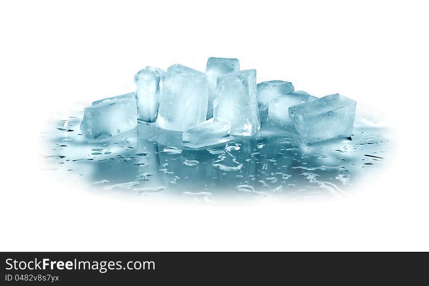 Few ice cubes on glass surface with reflection. Clipping path is included