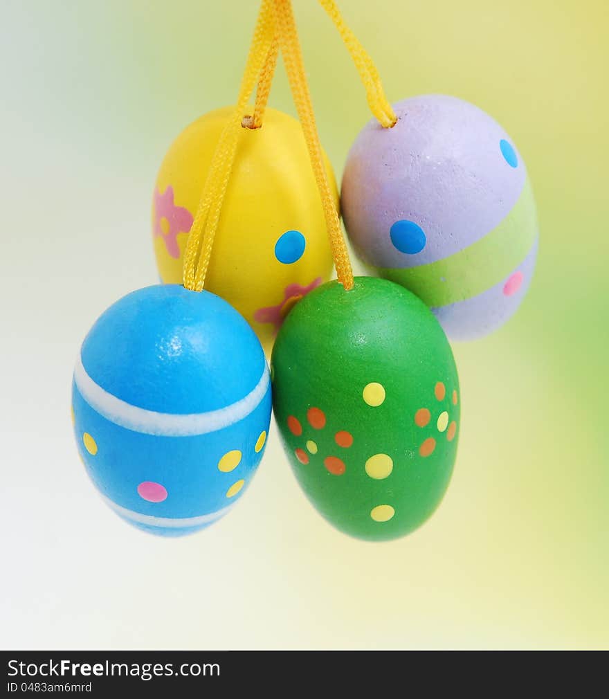 Easter eggs on blurred green  background