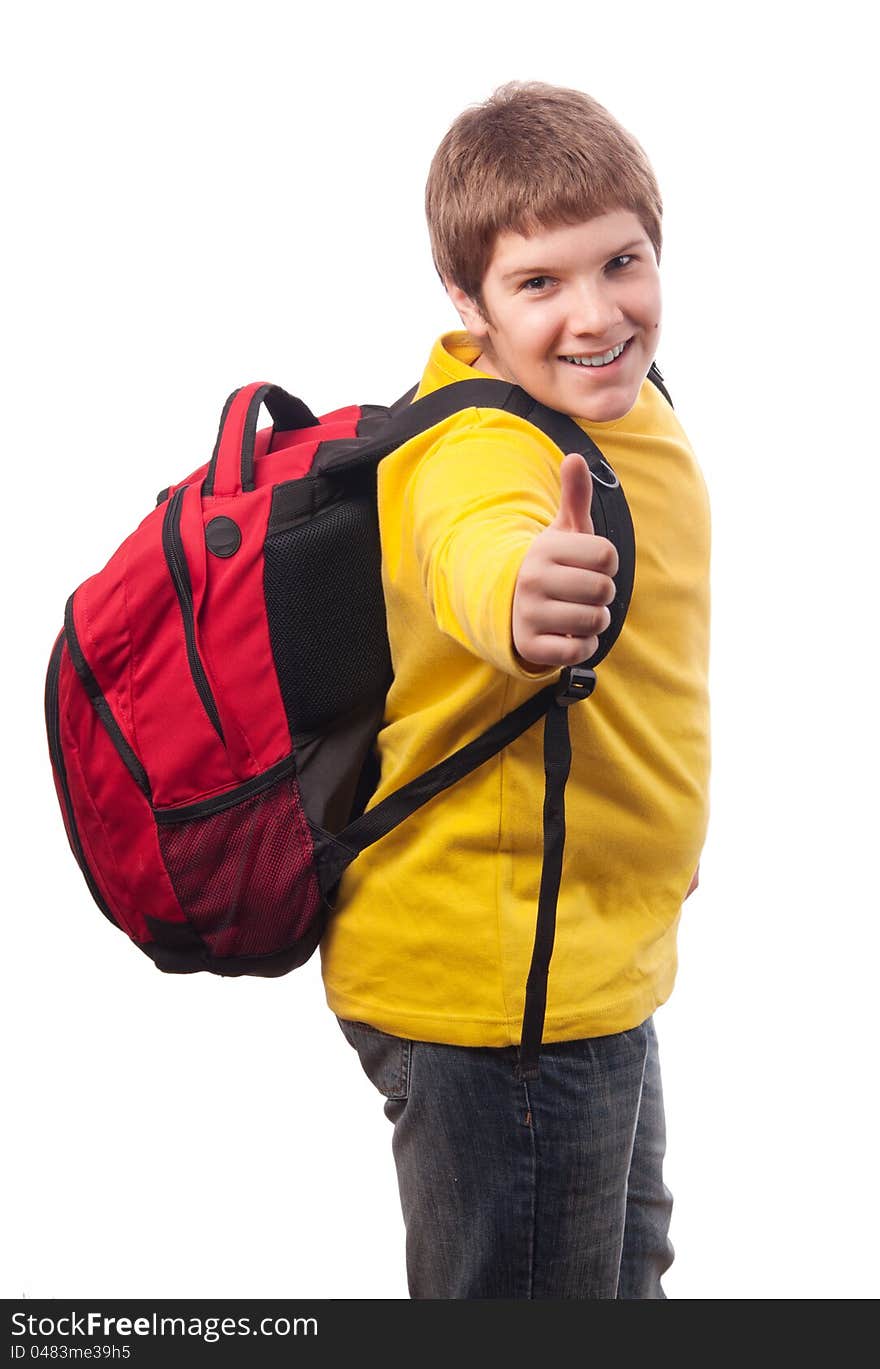 Handsome chubby teenage boy with school bag on his back showing thumbs up isolated on white. Handsome chubby teenage boy with school bag on his back showing thumbs up isolated on white.