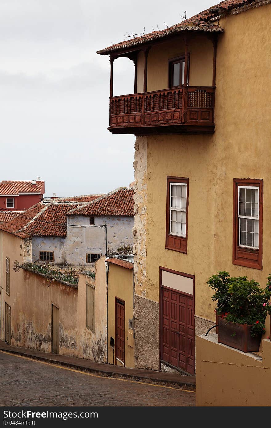 Mediterranean old original wooden balcony in Tenerife, Spain. Mediterranean old original wooden balcony in Tenerife, Spain