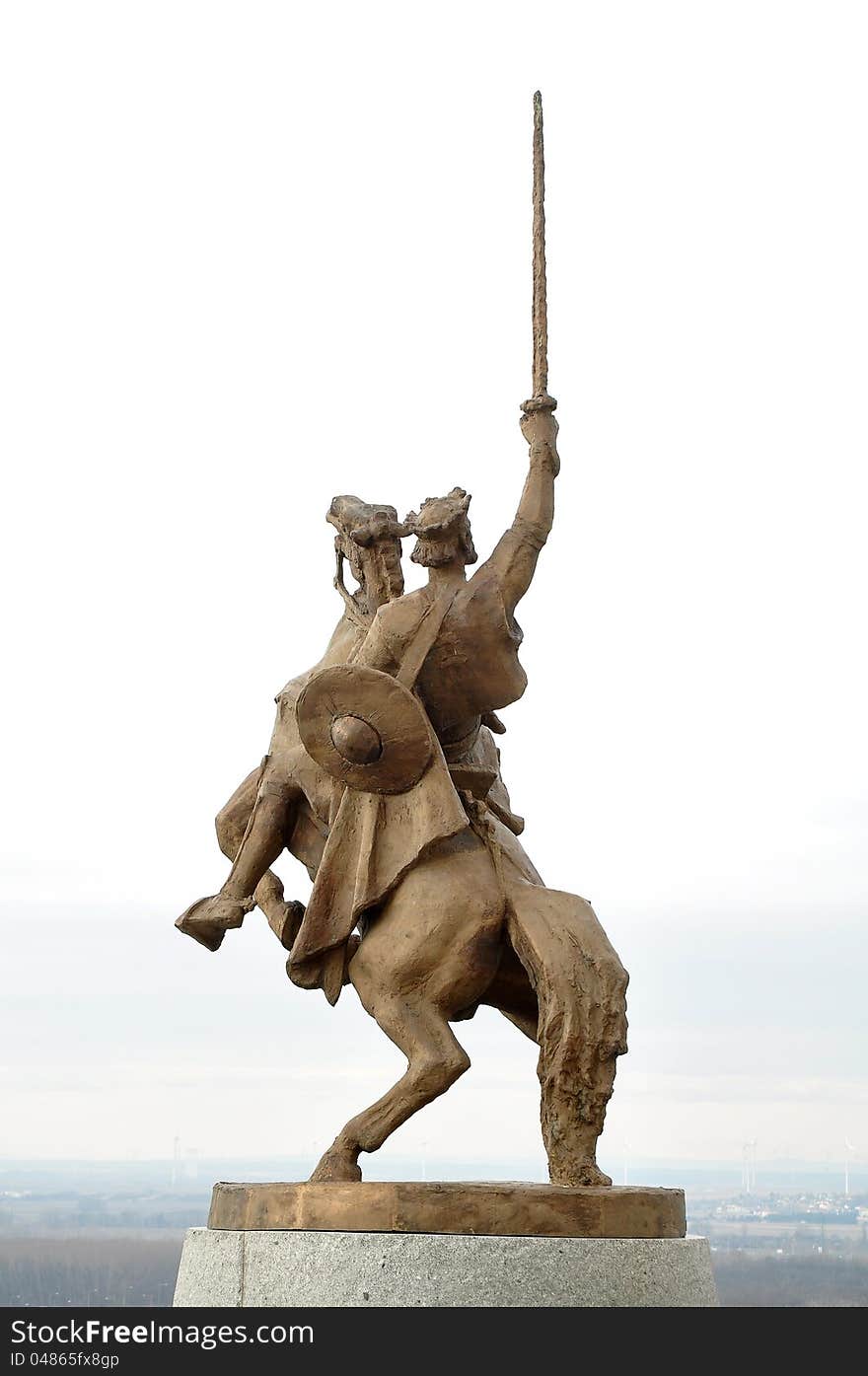 Statue of kin Svatopluk in front of Bratislava Castle, Petrzala suburb in background. Slovakia. Statue of kin Svatopluk in front of Bratislava Castle, Petrzala suburb in background. Slovakia.