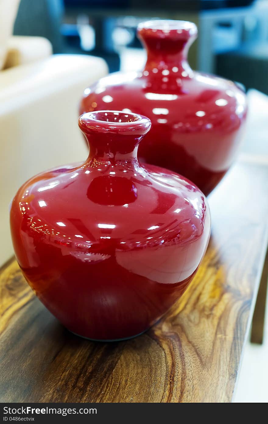 Picture a beautiful souvenir red vase. Picture a beautiful souvenir red vase