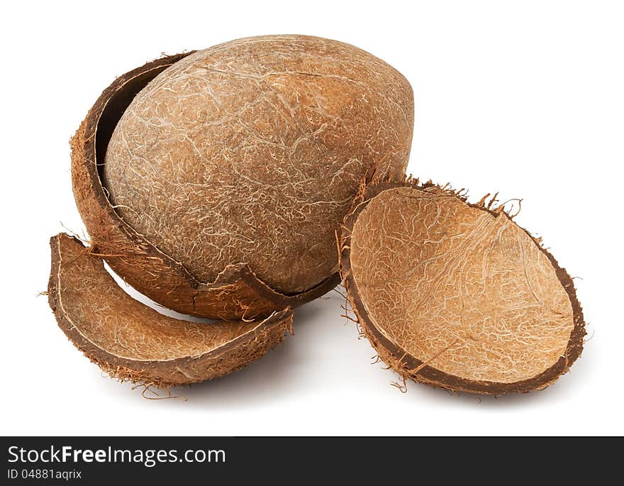 Cracked coconut against white background