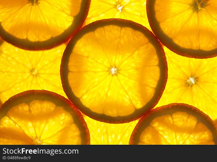 Orange slices background / macro / back lit