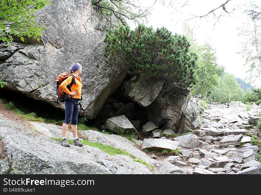 Girl standing on the rock. Girl standing on the rock