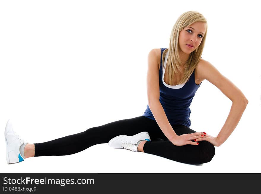 Fitness happy girl doing exercises on a floor. Fitness happy girl doing exercises on a floor