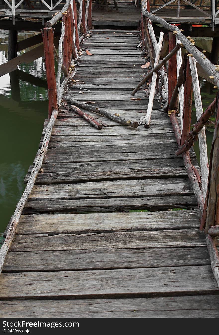 Old wooden bridge was damaged danger decay. Old wooden bridge was damaged danger decay.