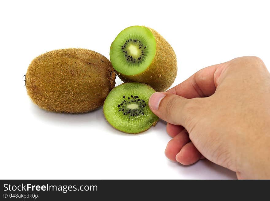 Pieces of kiwi whit hand